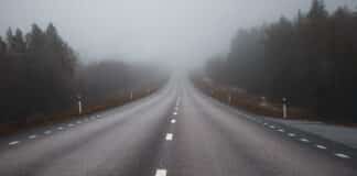 A lonely Swedish road in fog - No Brand Community For You